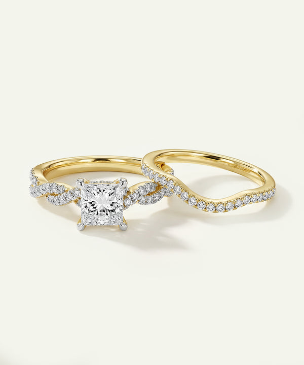 Gold ring with diamond on a white background