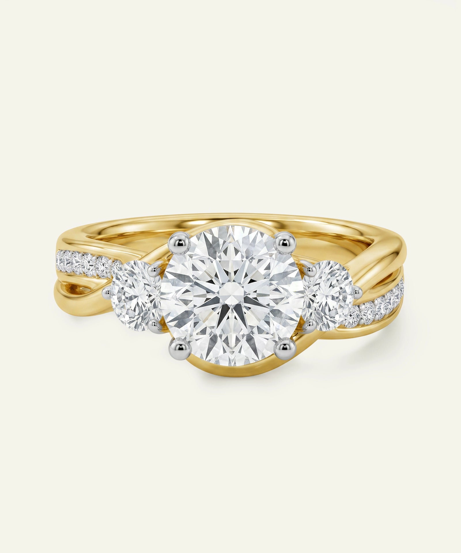 Gold ring with three diamonds on a white background