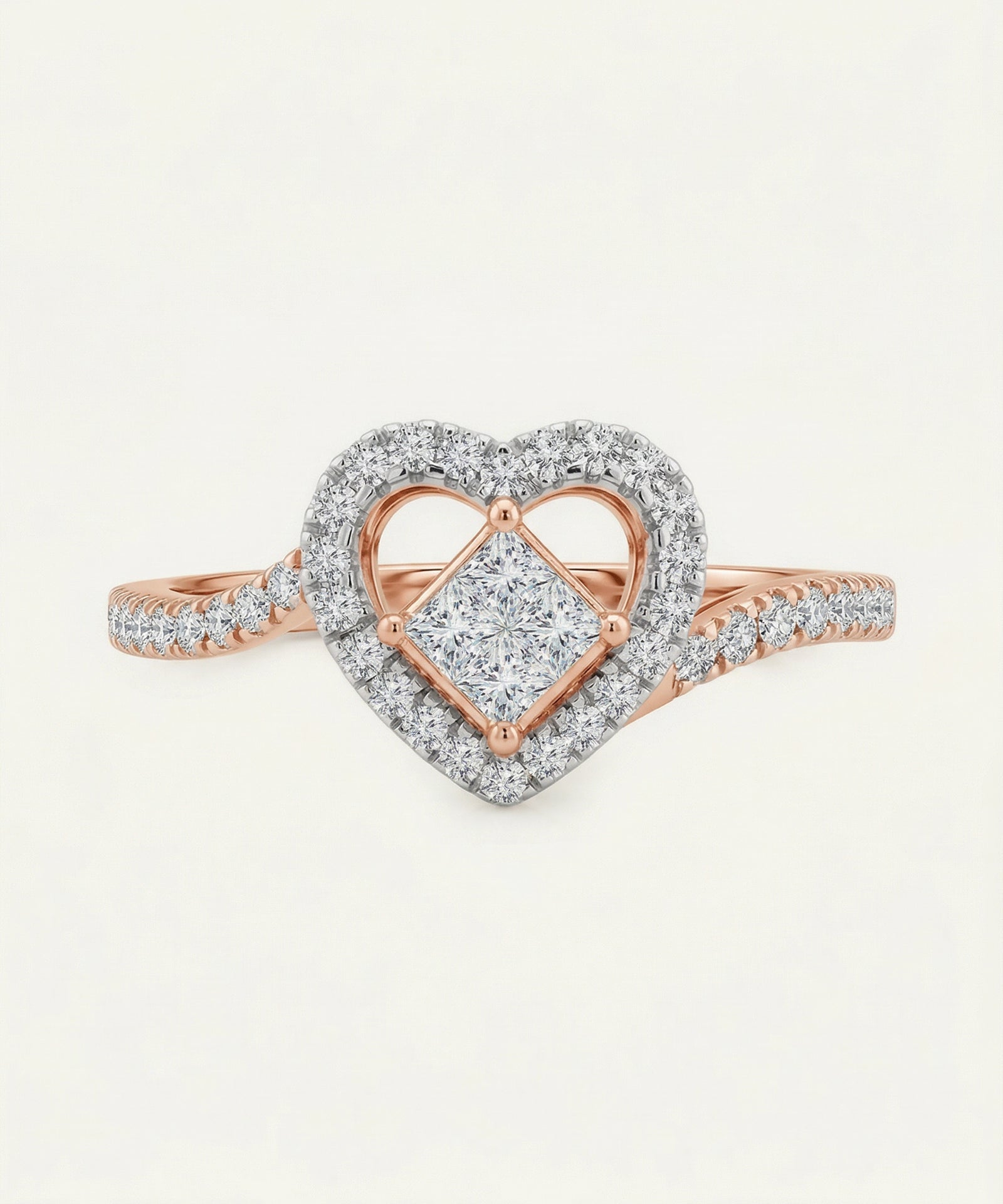 Rose gold and silver heart-shaped ring with diamonds on a light gray background