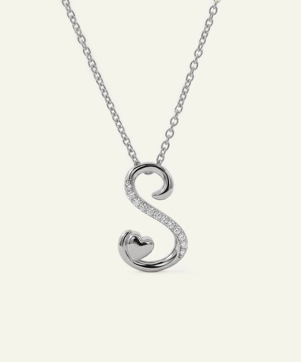Silver necklace with a 'S' shaped pendant on a white background