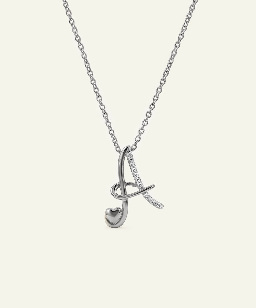 Silver necklace with a unique pendant on a light gray background