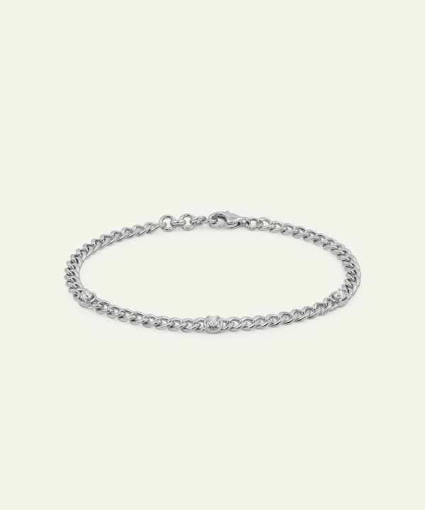 Silver chain bracelet on a white background