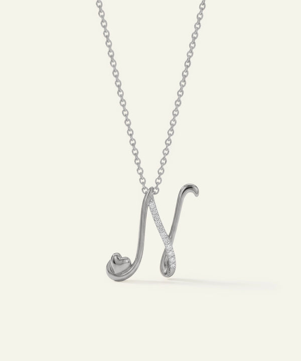 Silver necklace with a unique pendant on a white background