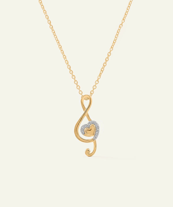 Gold necklace with a unique pendant on a light beige background