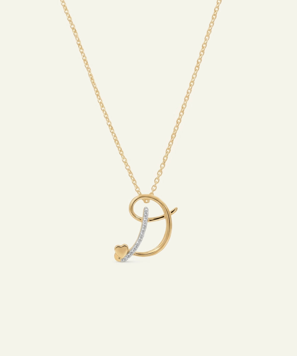 Gold necklace with a unique pendant on a light beige background