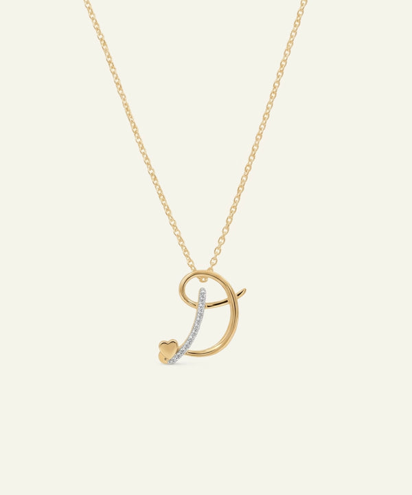 Gold necklace with a unique pendant on a light beige background