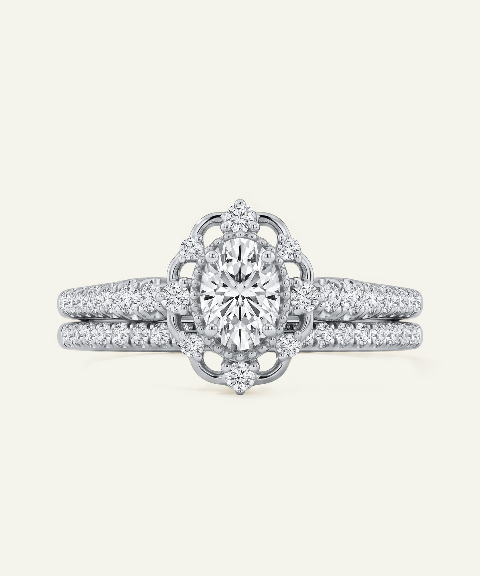 Diamond ring with intricate design on a light gray background