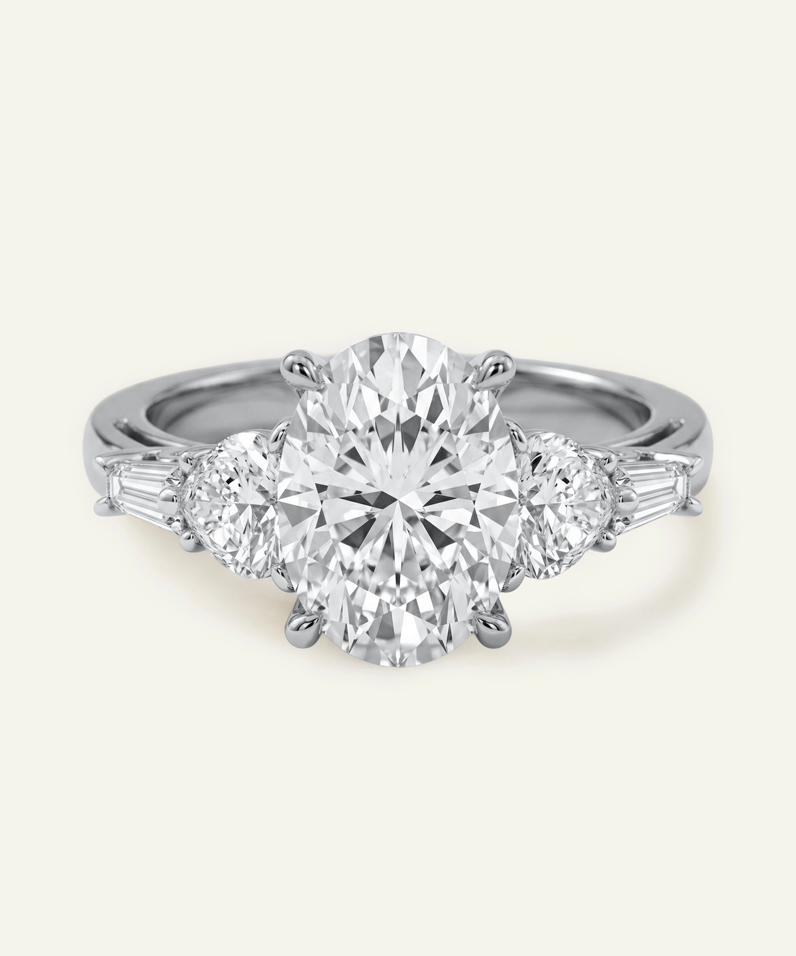 Diamond ring with a central gemstone and smaller stones on a white background