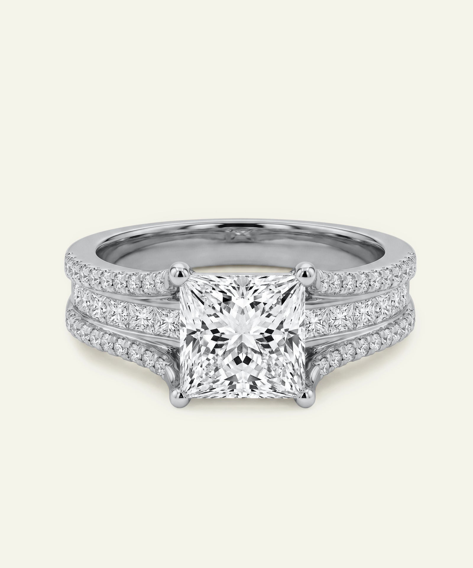 Diamond ring with a white gemstone on a light gray background