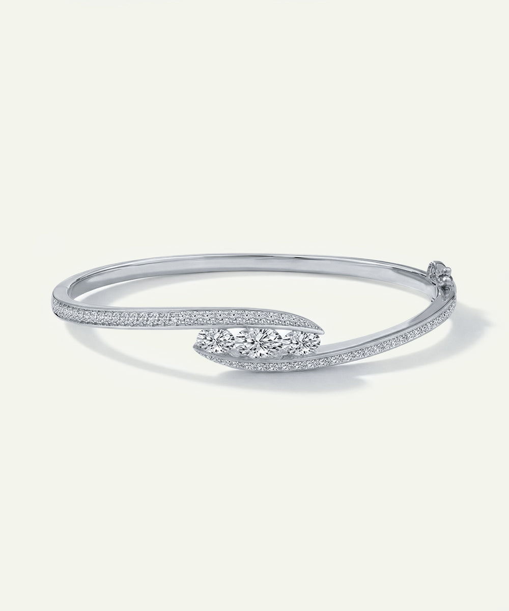 Silver bracelet with diamonds on a white background