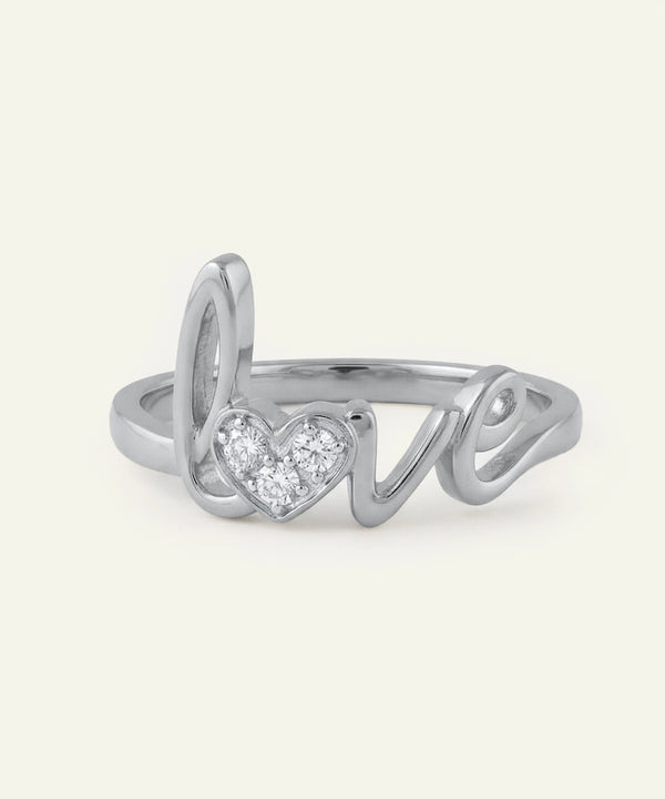 Silver ring with 'love' and heart design on a white background
