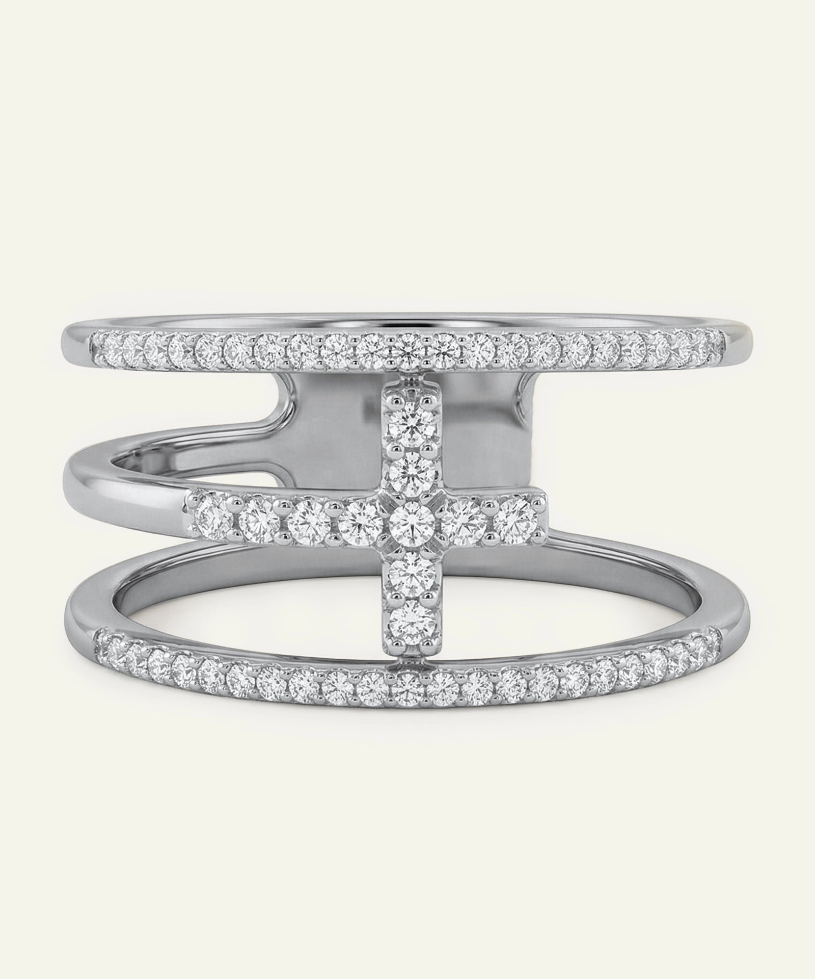 Silver ring with diamond accents on a white background