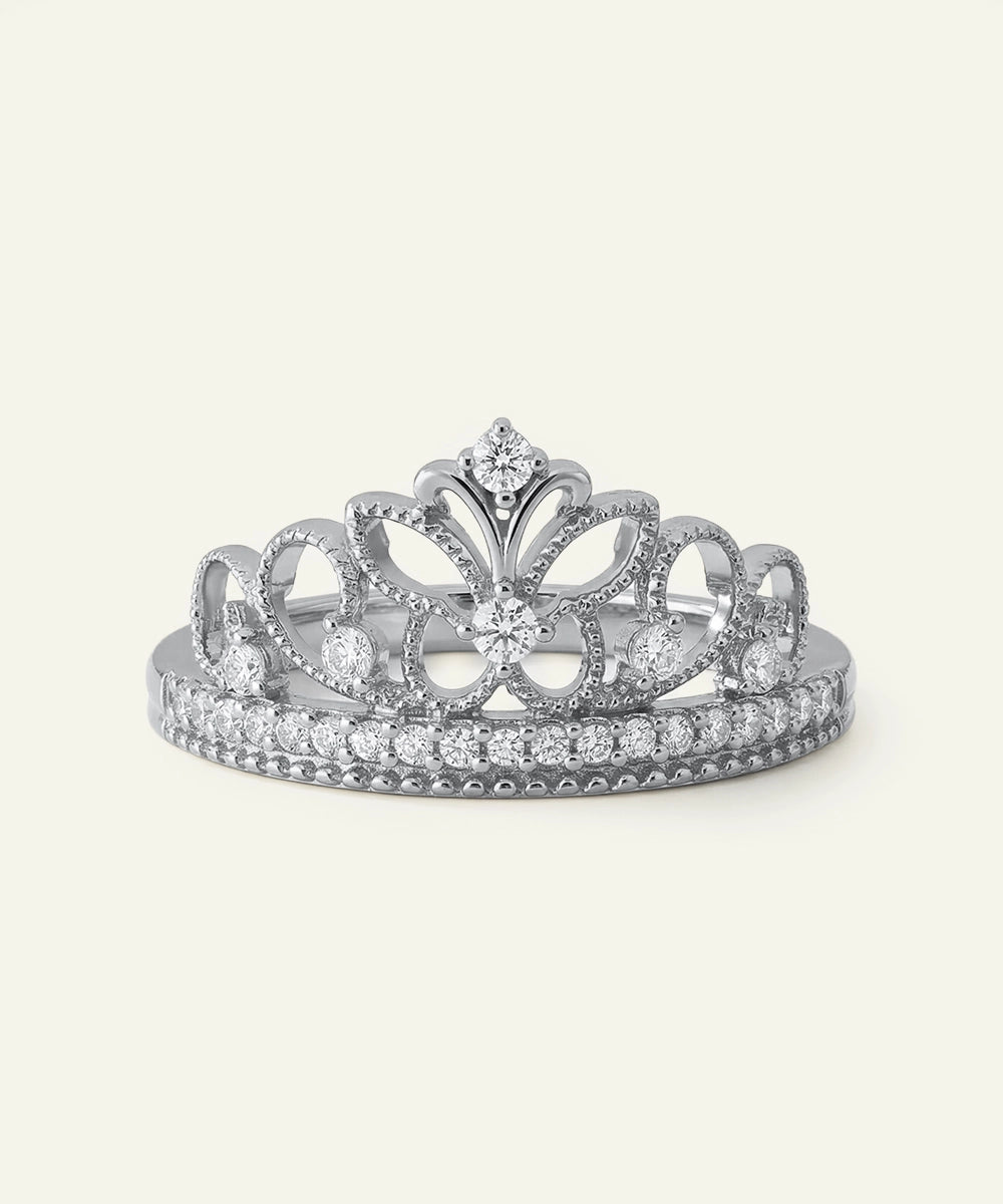 Silver tiara with gemstones on a white background