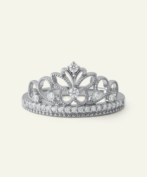 Silver tiara with gemstones on a white background