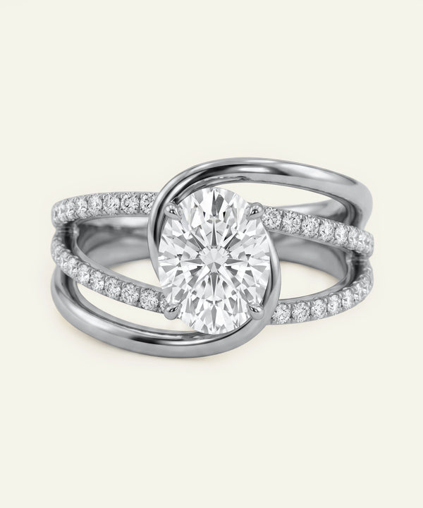 Two silver rings with diamond accents on a white background