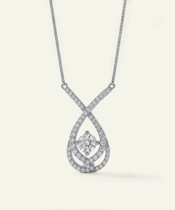 Diamond necklace with a teardrop pendant on a white background