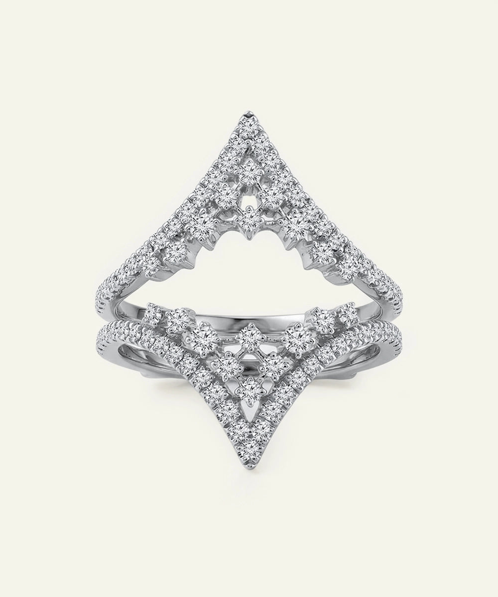 Diamond ring with a geometric design on a white background