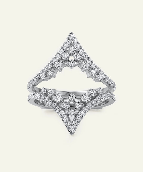 Diamond ring with a geometric design on a white background