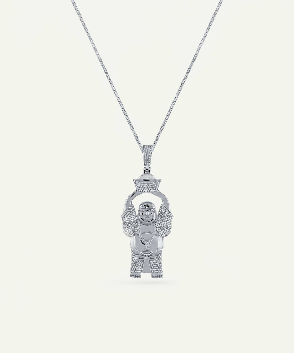 Silver pendant necklace with a detailed design on a white background