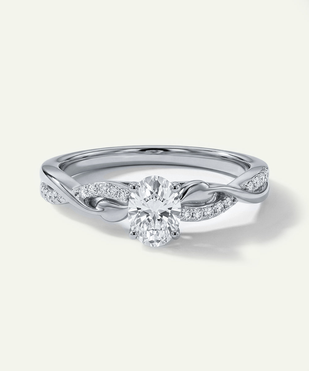 Silver ring with a diamond on a white background