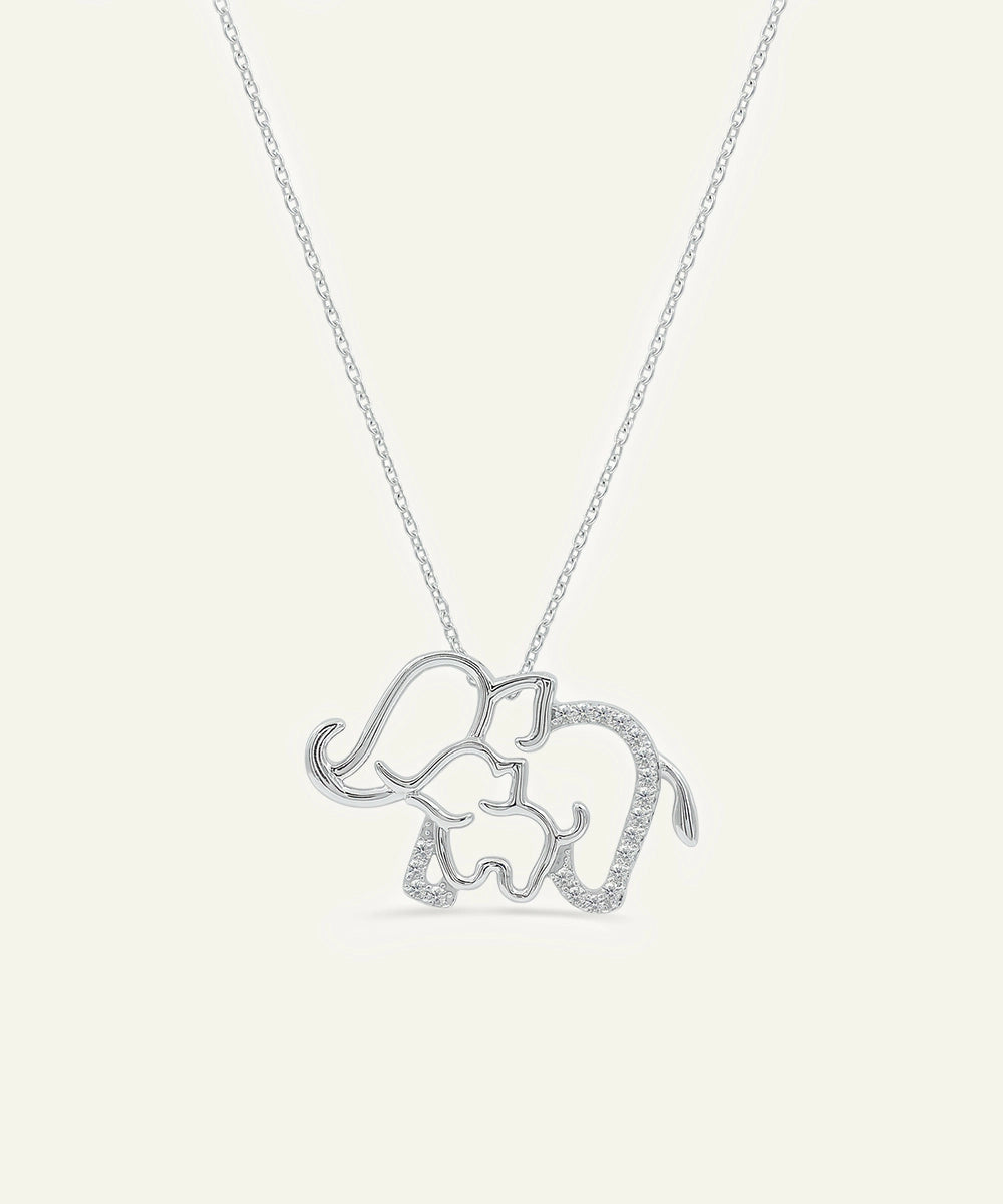Silver elephant pendant necklace on a white background