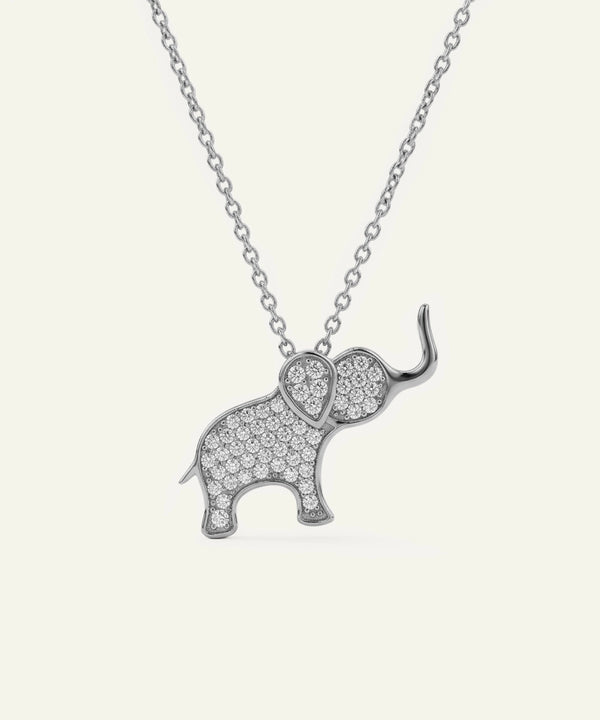 Silver elephant pendant necklace on a white background