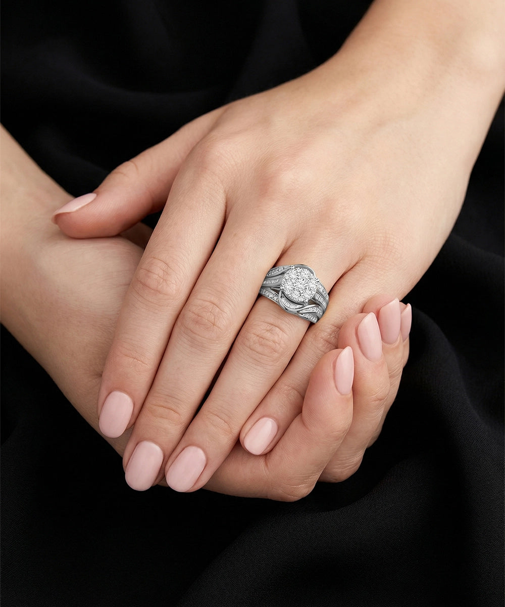 Silver ring on a hand with a dark background