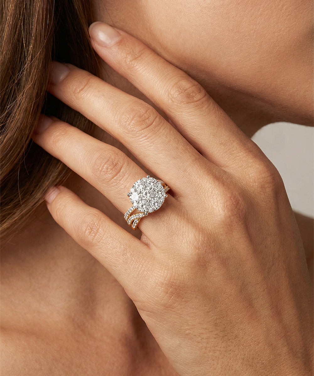 Close-up of a hand wearing a diamond ring with a soft background