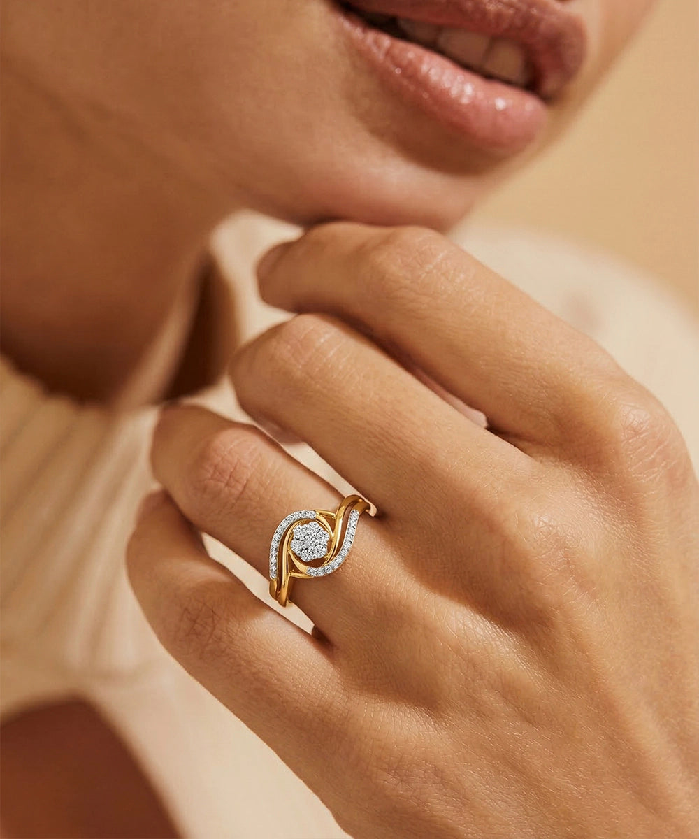 Close-up of a hand wearing a silver ring with a diamond on a soft background