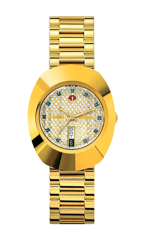 Gold wristwatch with a detailed face on a white background