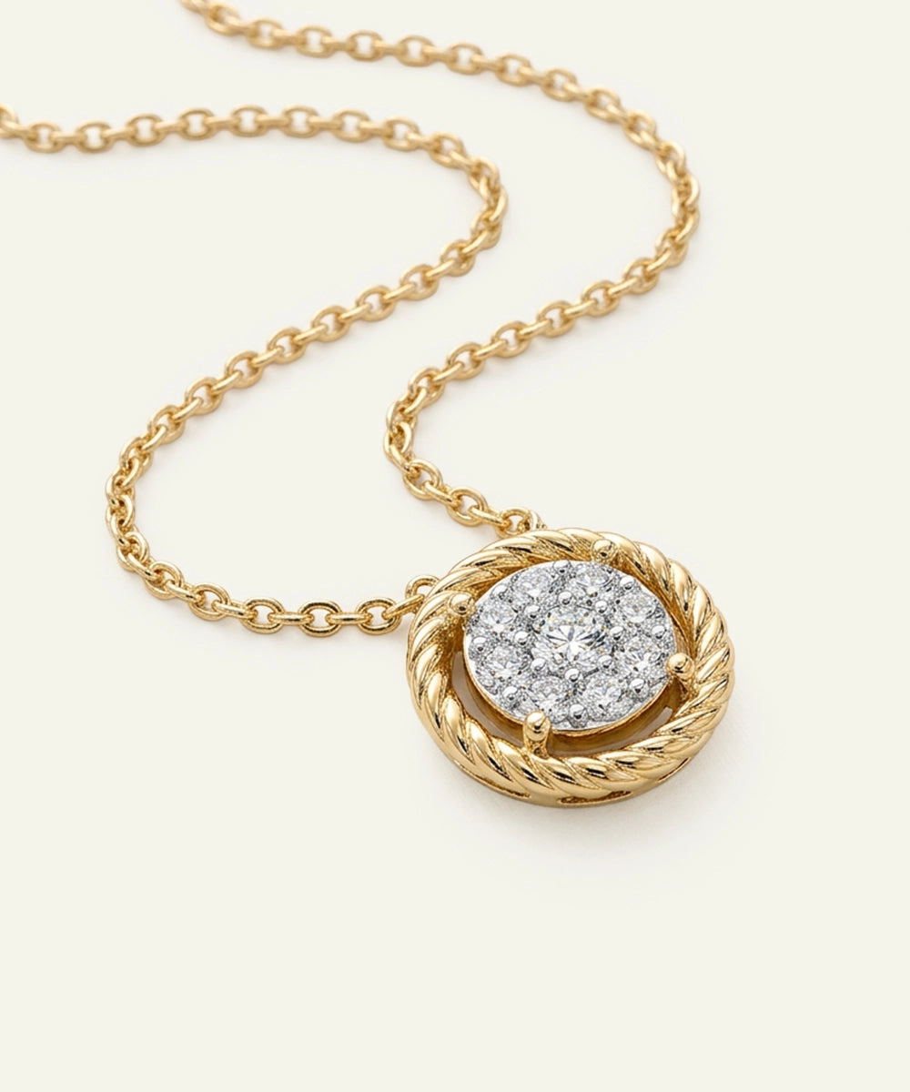 Gold necklace with a diamond pendant on a white background