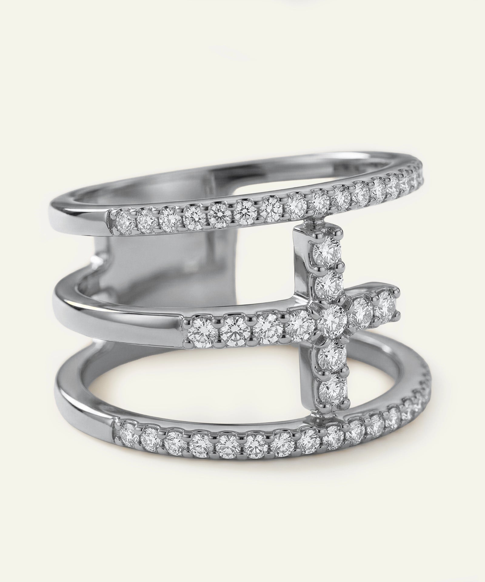 Silver ring with diamond accents on a white background