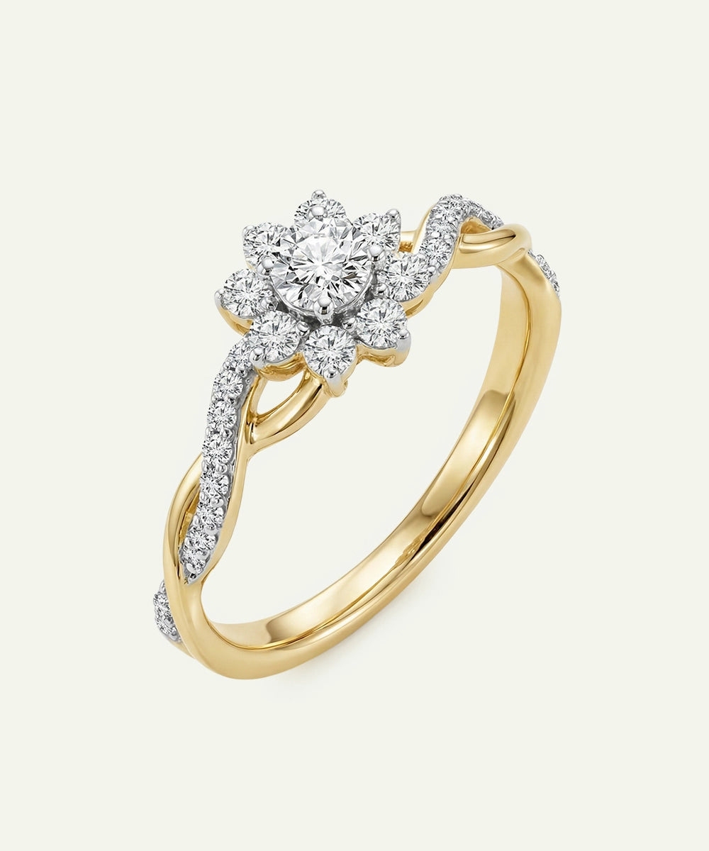 Gold ring with diamond flower design on a white background