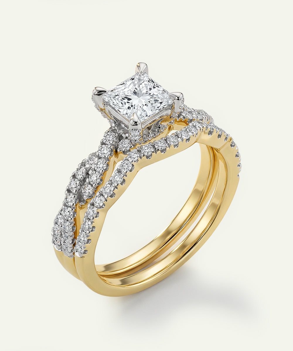 Gold ring with a diamond on a white background