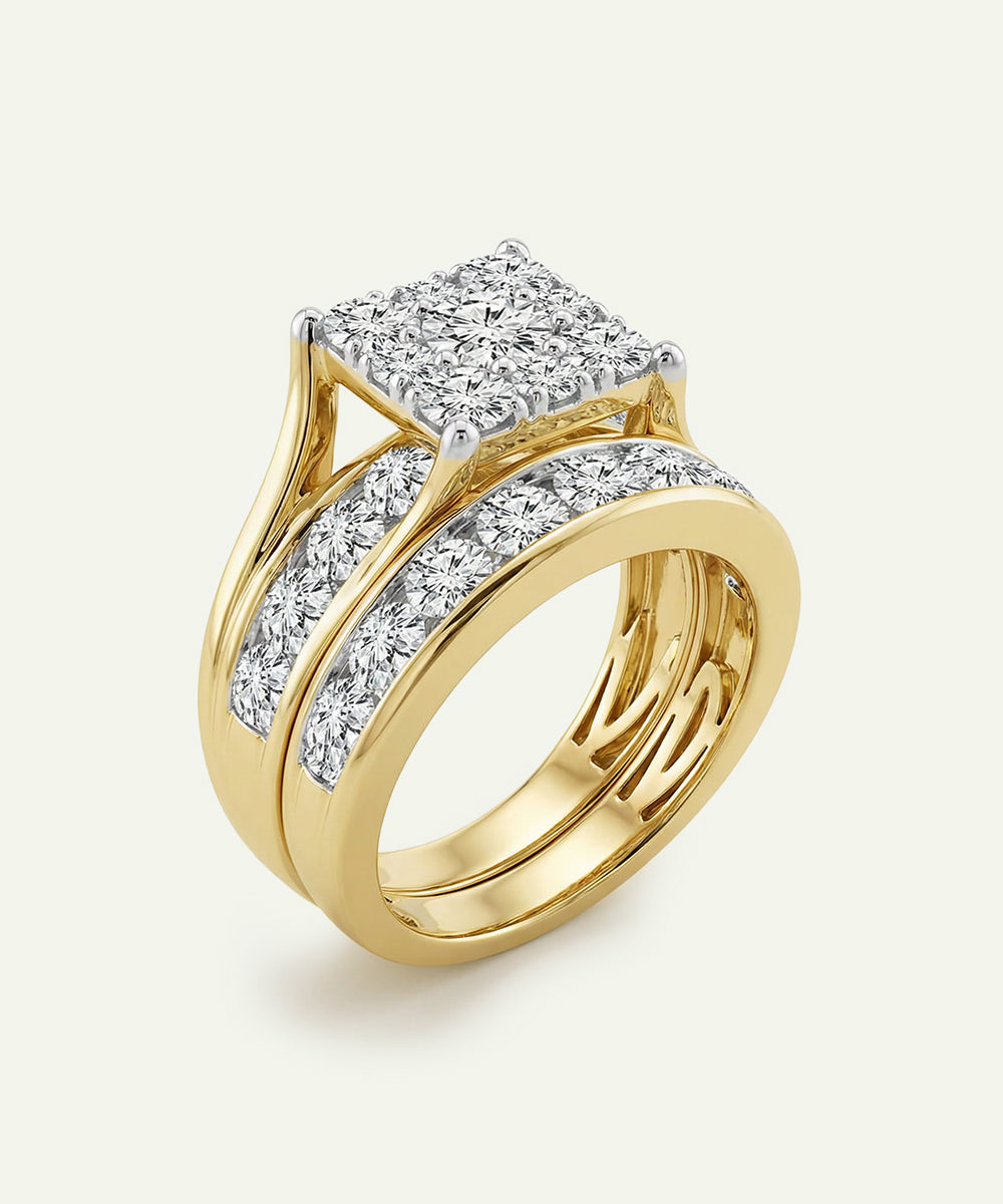Gold ring with diamond accents on a light gray background