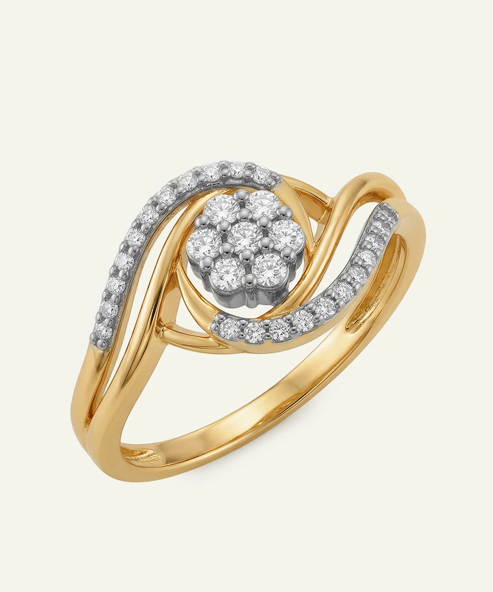 Gold ring with diamond accents on a light gray background