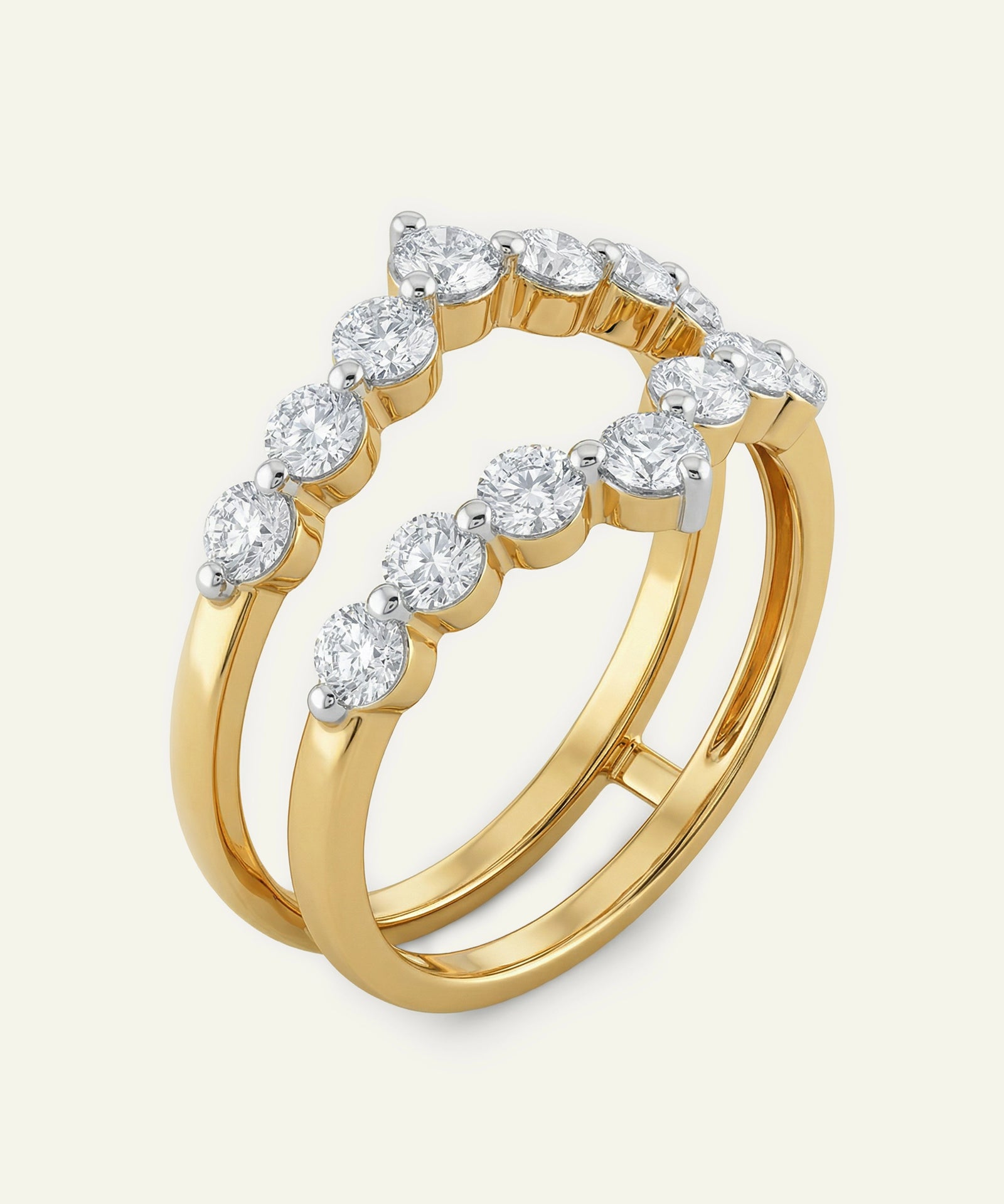 Gold ring with diamond stones on a white background