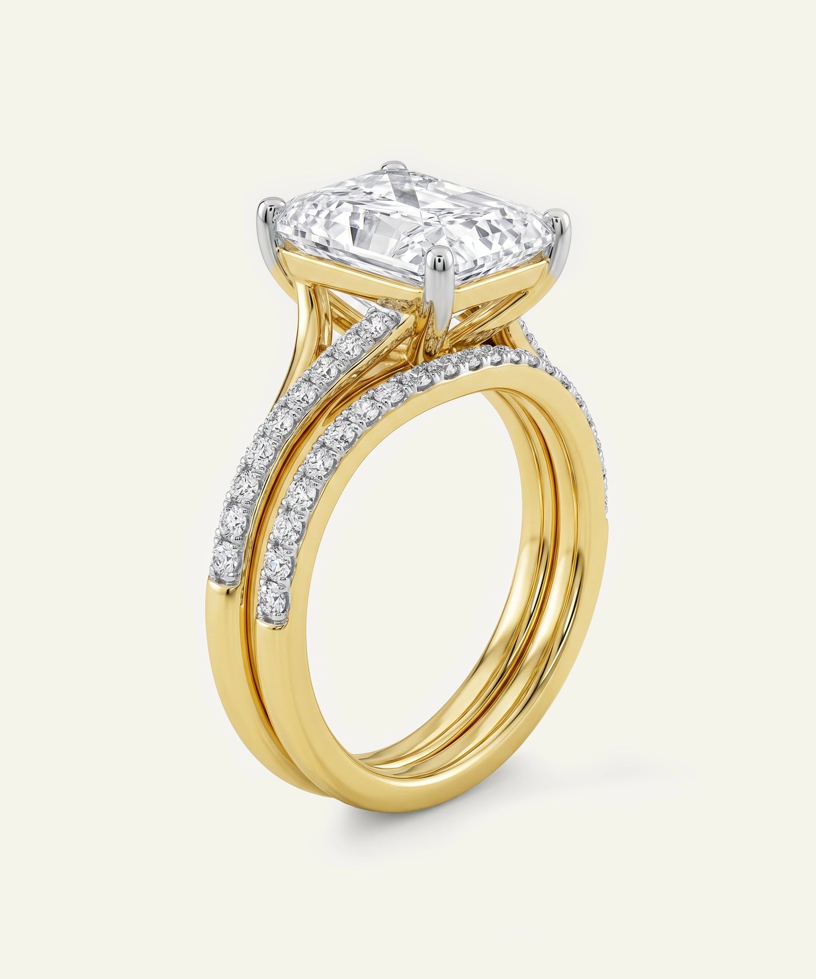 Gold ring with a diamond on a white background