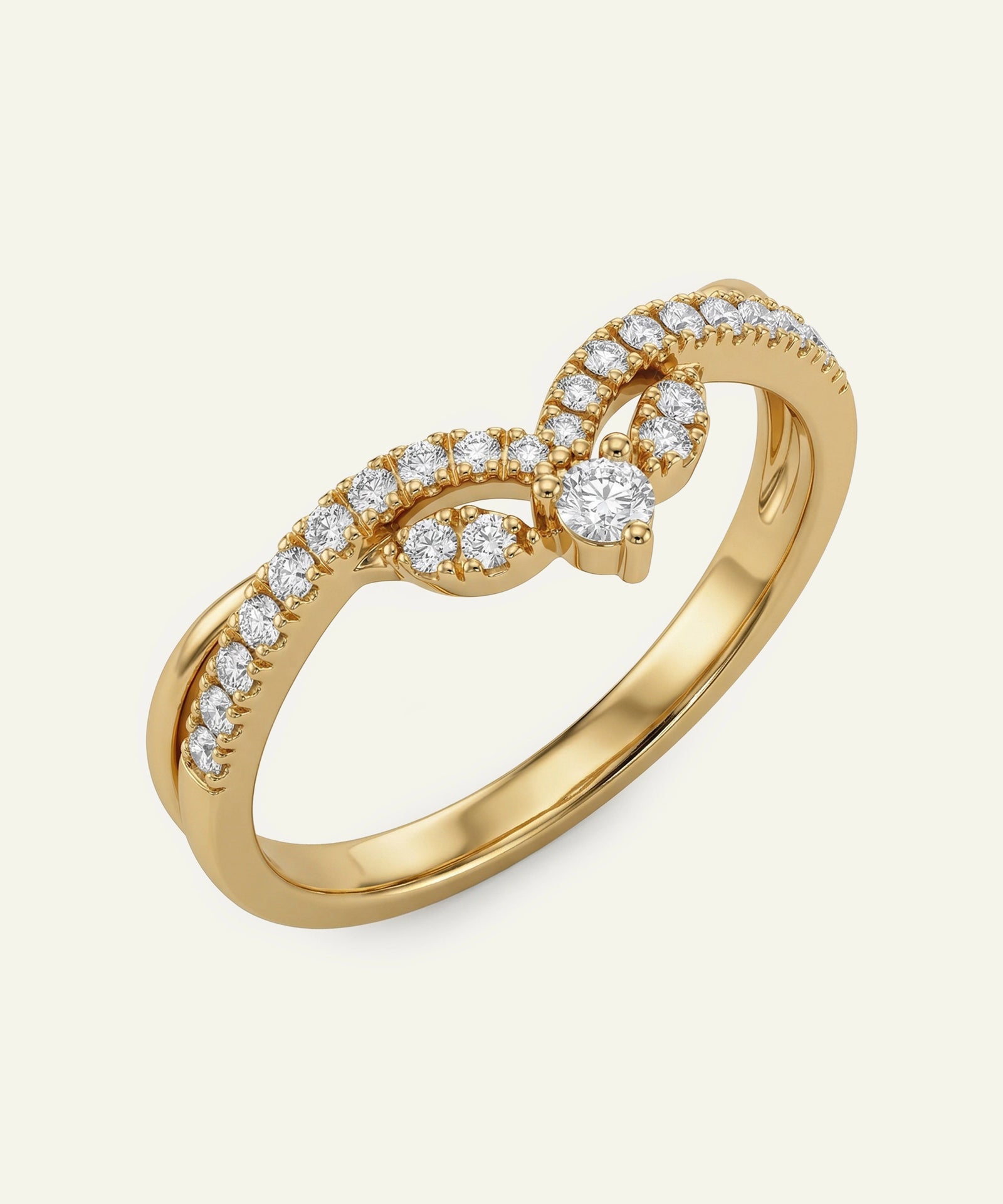 Gold ring with diamond accents on a white background