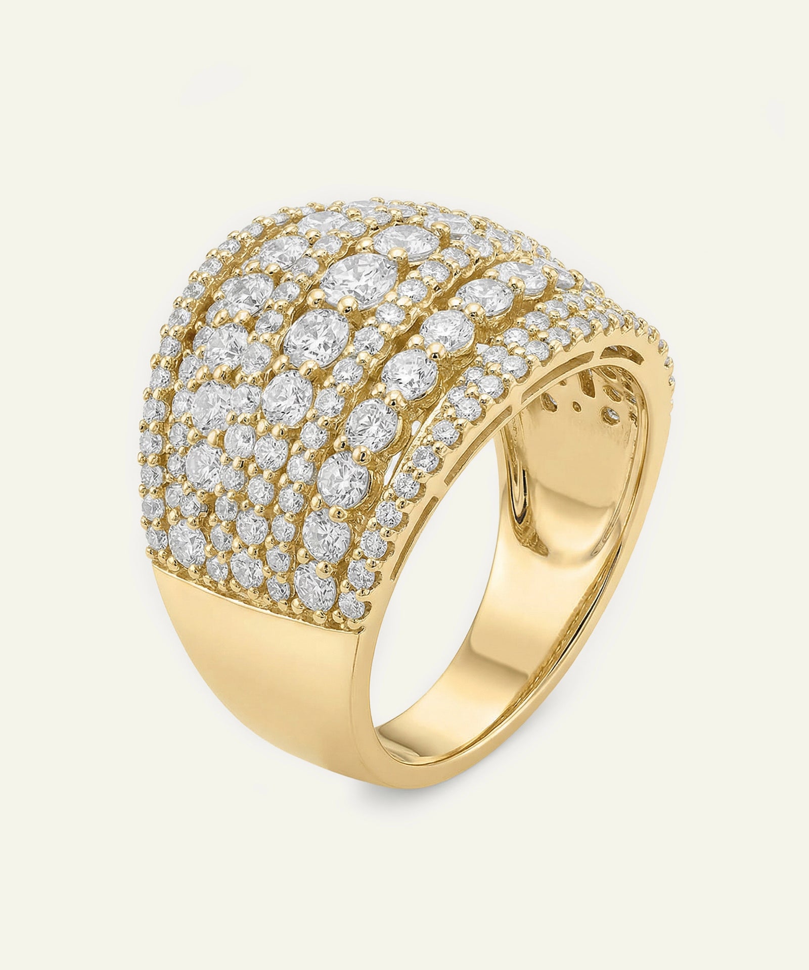 Gold ring with diamond accents on a white background