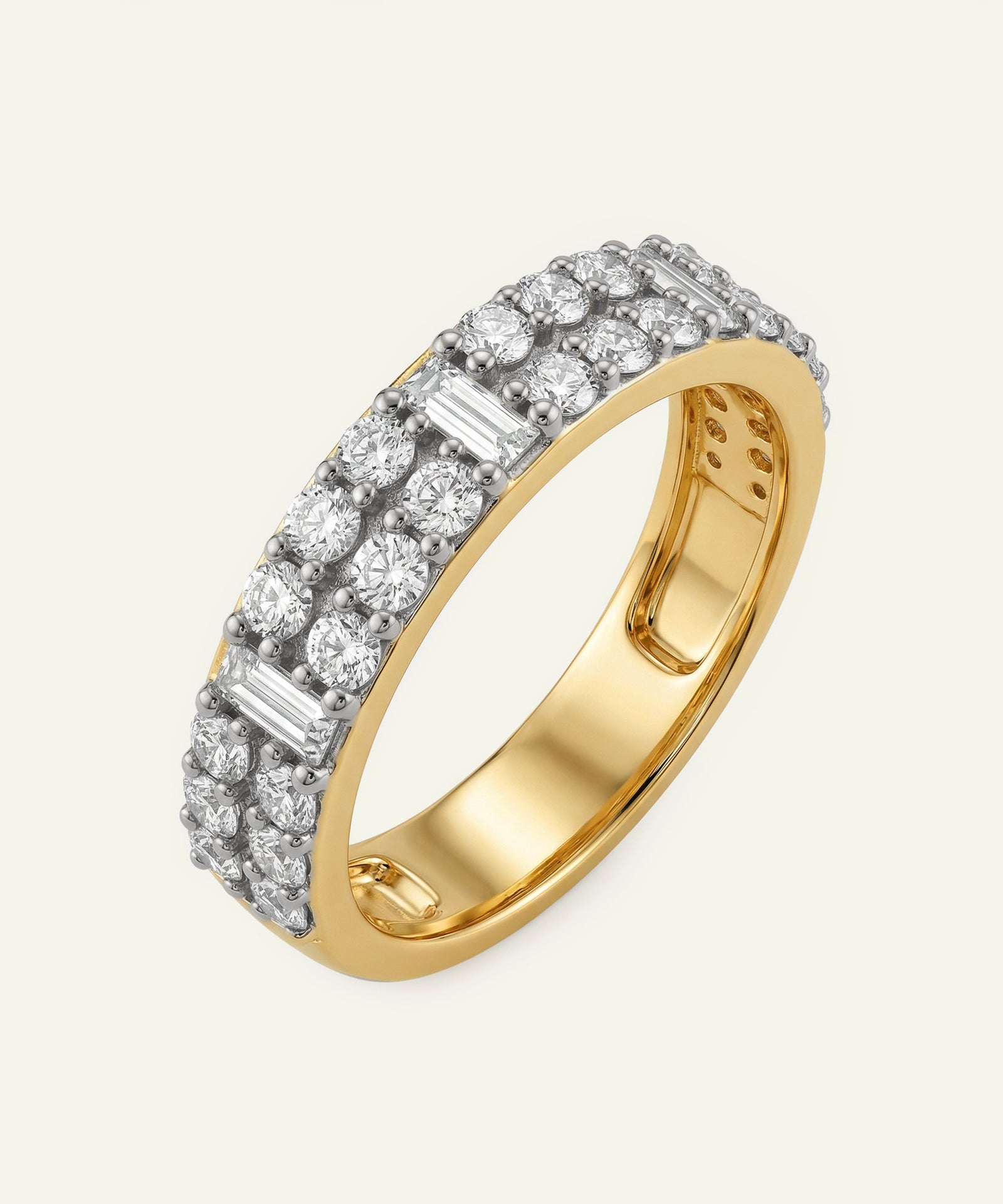 Gold ring with diamond accents on a white background