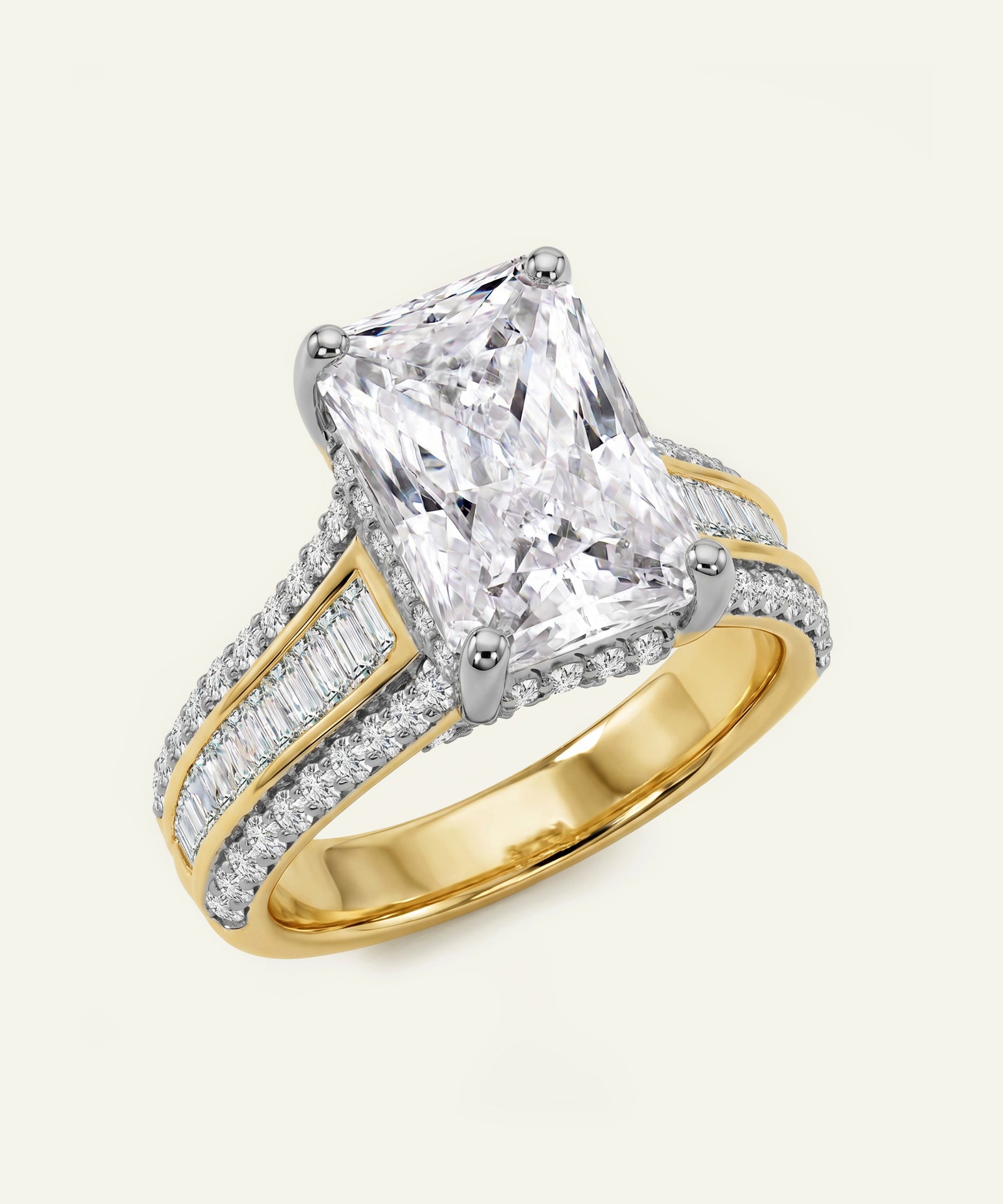 Gold and silver ring with a large diamond and smaller diamonds on a white background