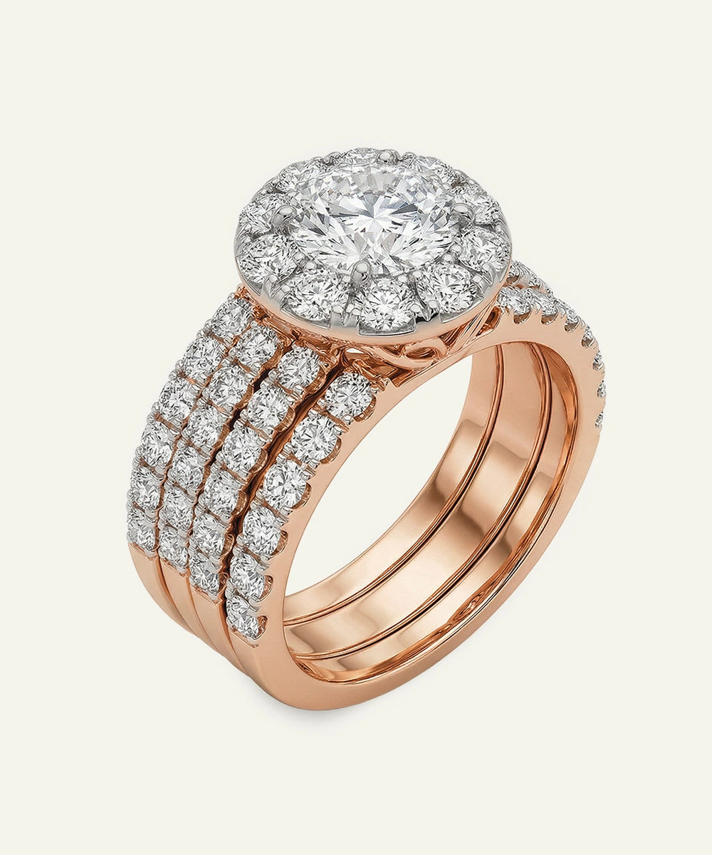 Rose gold ring with diamond accents on a white background