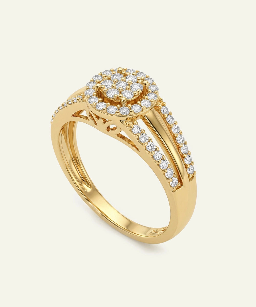 Gold ring with diamond accents on a light beige background