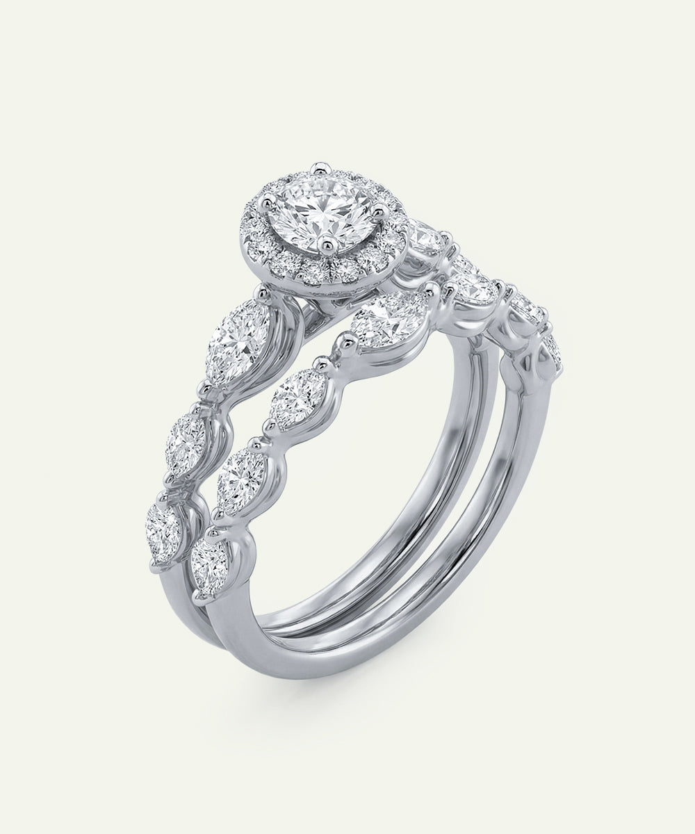Diamond ring set on a light gray background