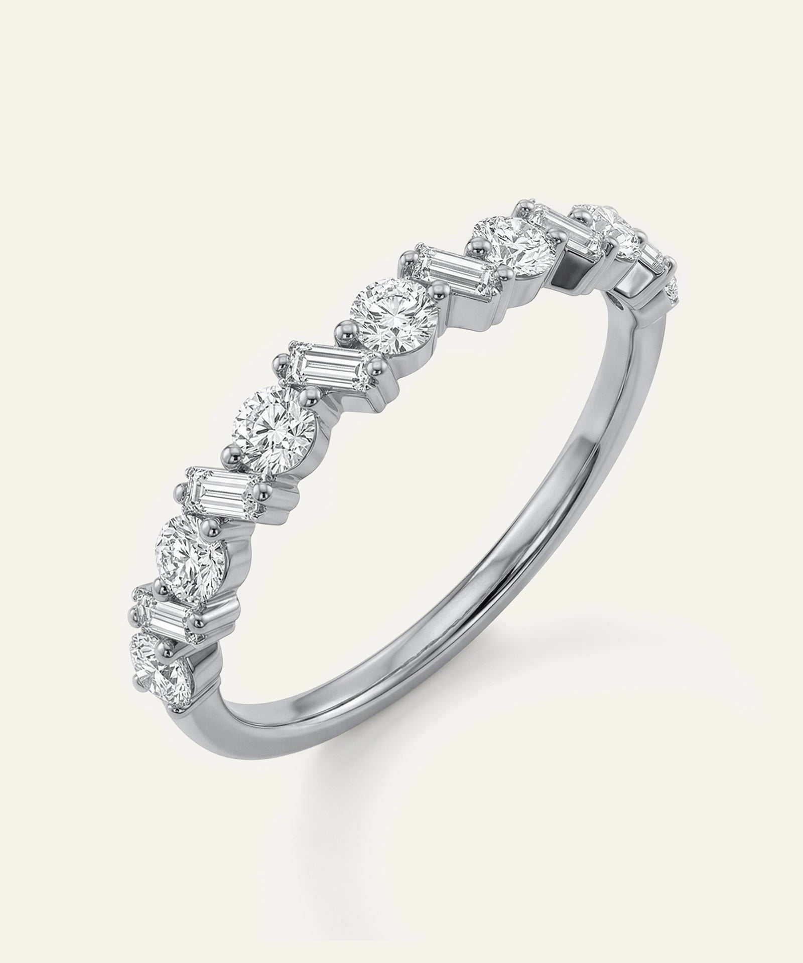 Diamond ring with various shaped diamonds on a white background