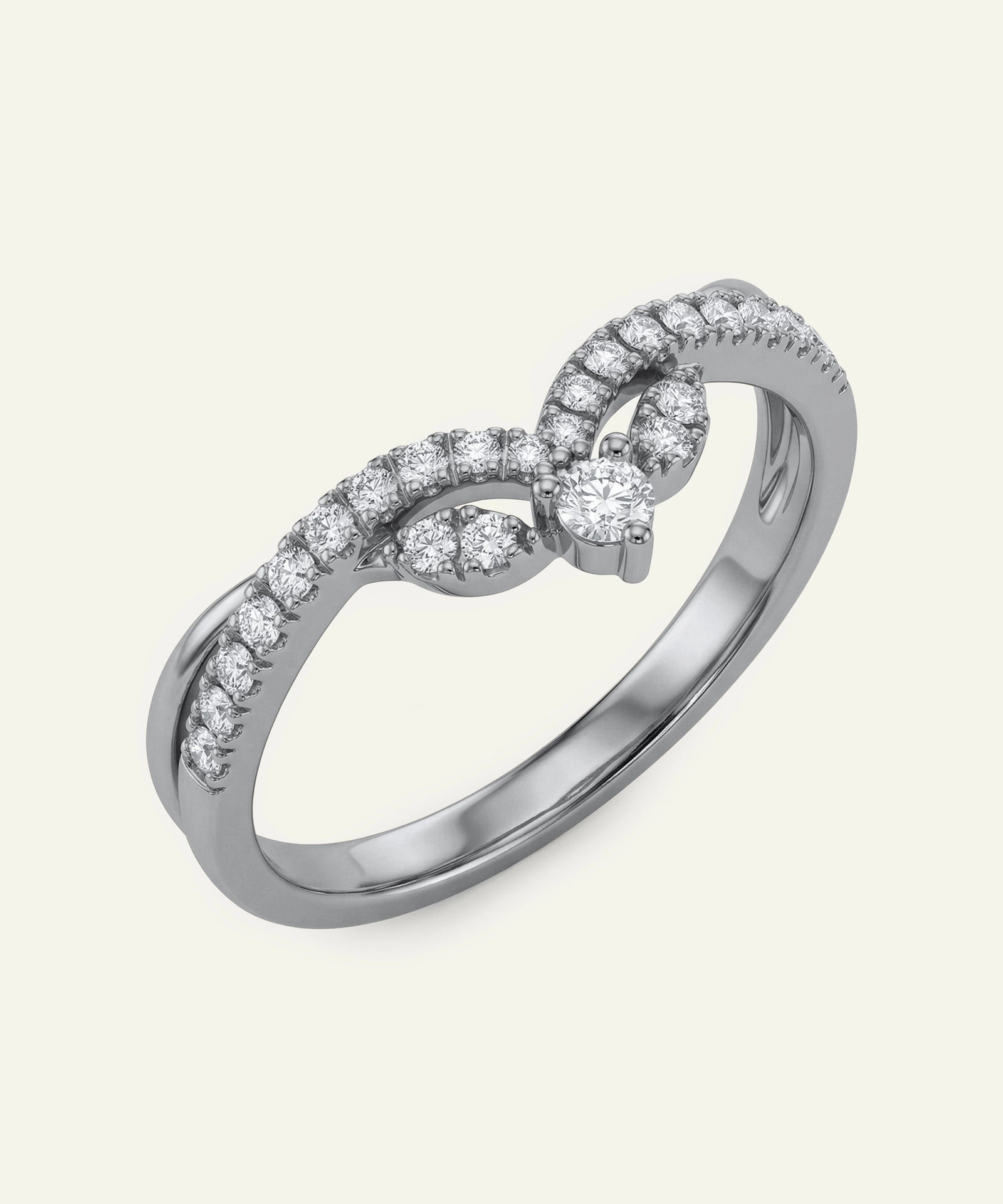 Silver ring with diamond accents on a white background