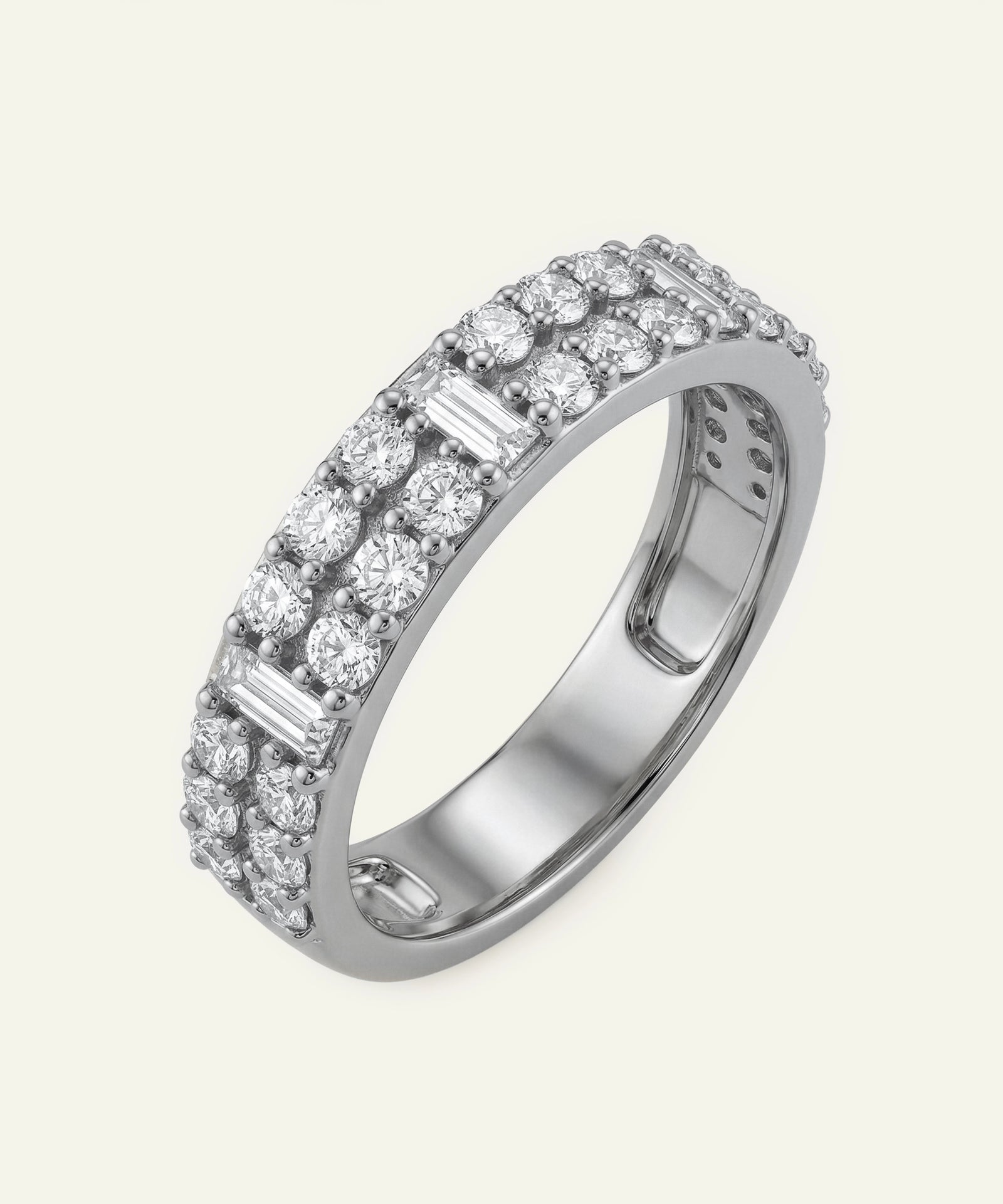 Silver ring with diamond accents on a white background