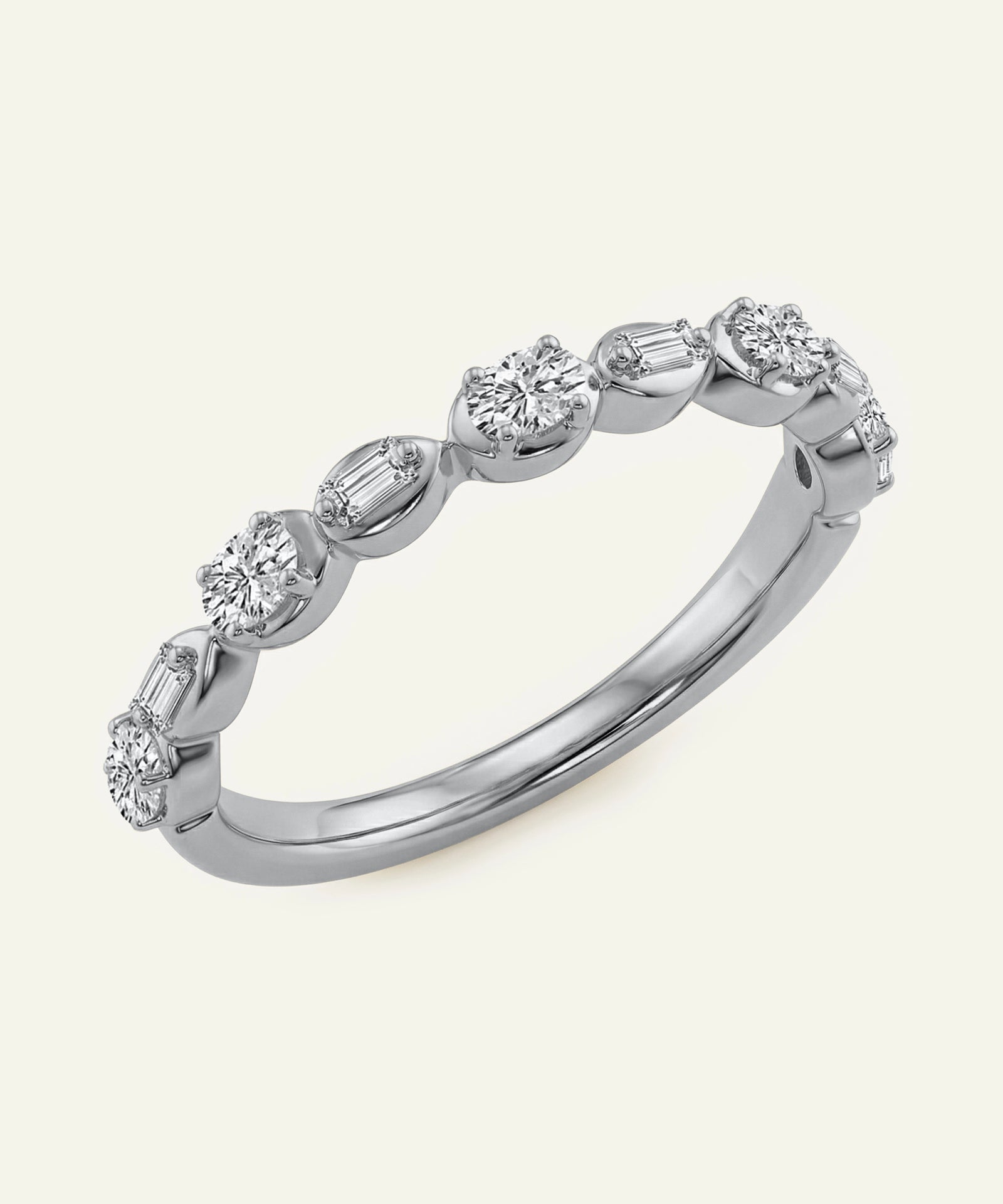 Silver ring with diamond stones on a white background