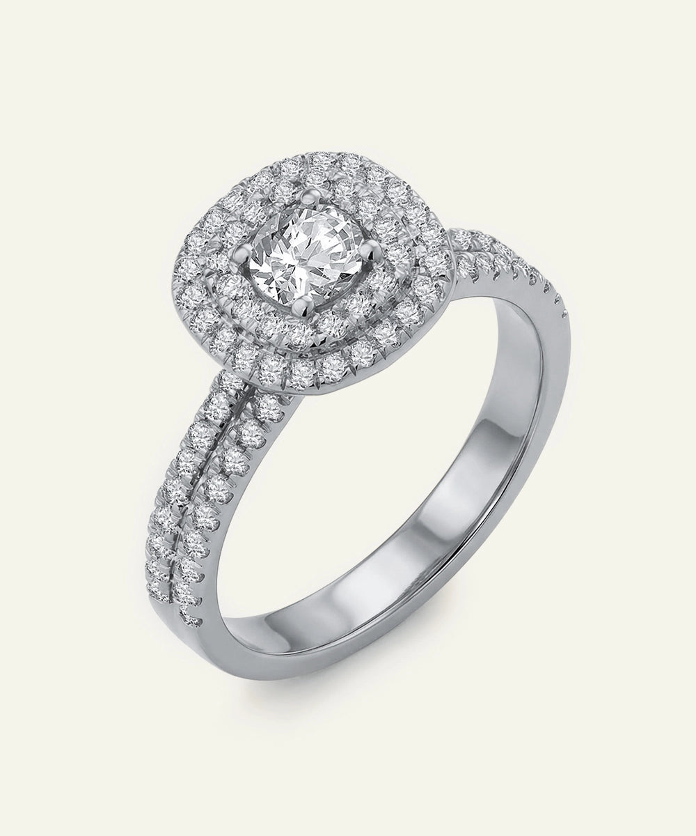 Silver ring with a diamond on a white background